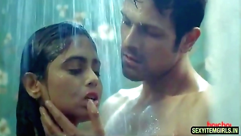 A brunette is doing a shower and she is getting fucked