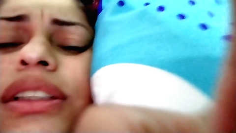 Indian brunette with a sexy tummy and a ponytail gets some cream