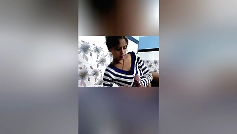 Indian brunette is sitting on laptop and she is not alone