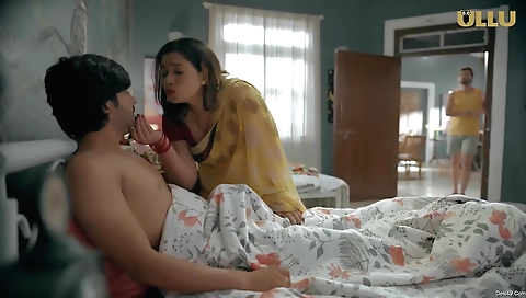 Brunette with a nice smile calls someone on the phone