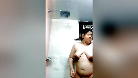 Indian teen in a big booty shower shows off her body