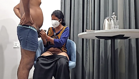 Amateur brunette in a sexy outfit is getting a handjob