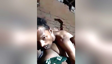 Indian girl in a white dress and a black suit with a guy