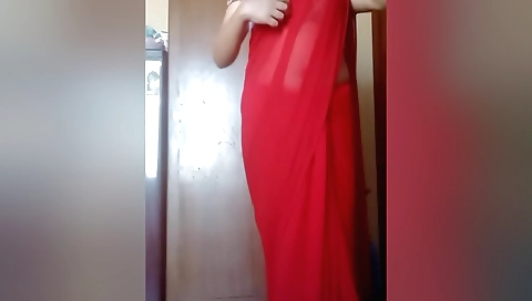 Sexy webcam solo scene with a horny girl in red dress