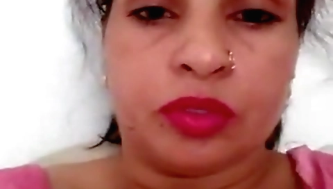 She has fun with her sexy vibrator and her cucumber