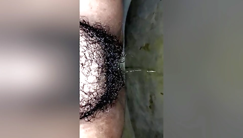 Busty hairy milf giving a blowjob and pokes her hairy pussy