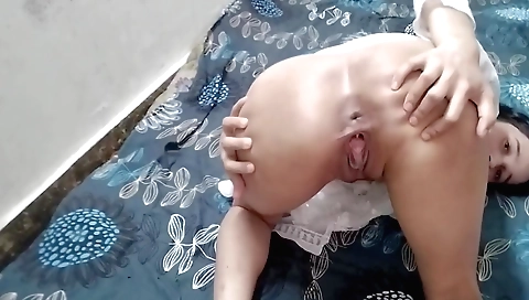 Indian woman shows her white dress and her long legs