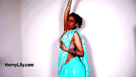 Busty Indian beauty stripping naked on webcam video