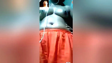 Cute brunette 18+ beauty in a black pantyhose is showing her body