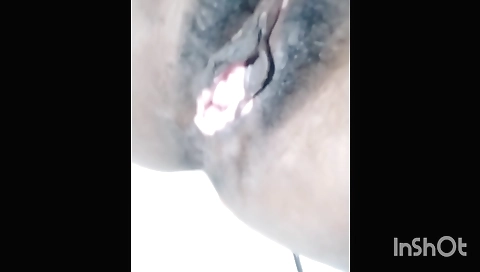 Hairy girl is creating some sexiness with her pussy