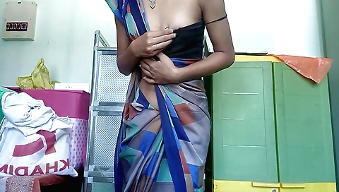 Sexy Indian beauty in sexy dress showing off her body