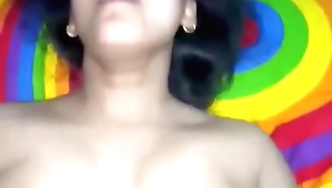 Indian girl with a pink top and blue shorts fucks herself