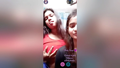 Busty brunette lesbian chick gives a sexy tango show