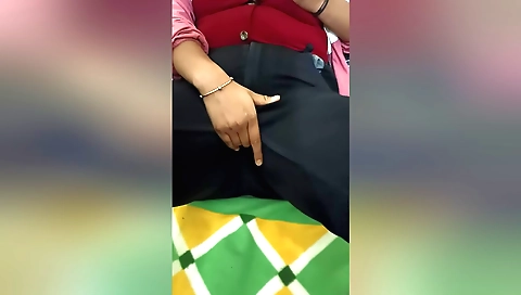 One brunette in a short skirt playing in the living room