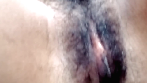Hairy indian solo female sucks a dildo and gets it inside