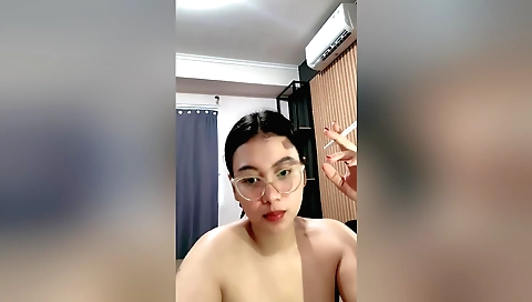 Busty brunette girl with a beautiful smile gives a solo video