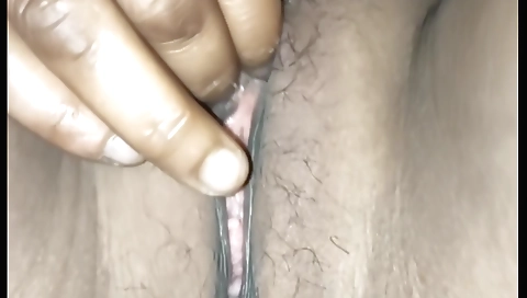 Indian naked babe with hairy pussy is masturbating