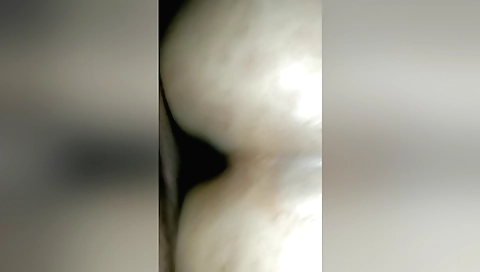 Young girl is working in the kitchen in a tight homemade video